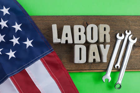Happy labor day banner usa flag and letters on rustic wooden background
