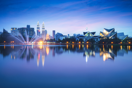 Kuala lumpur city with reflection in water kuala lumpur malaysia Stock Photo